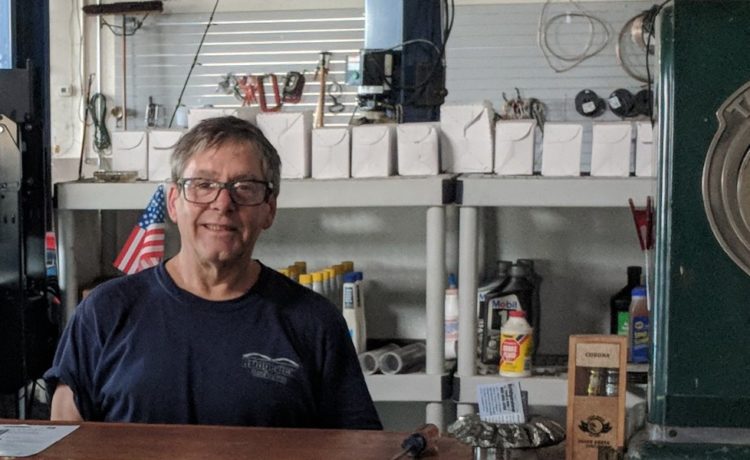 Tim Anderegg at front desk at Bridgeview Truck and Auto